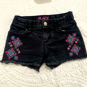 Girls size 6 black shorts